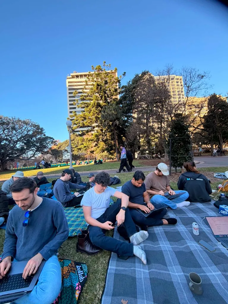 Sunny group shot with Sydney Tower in the background